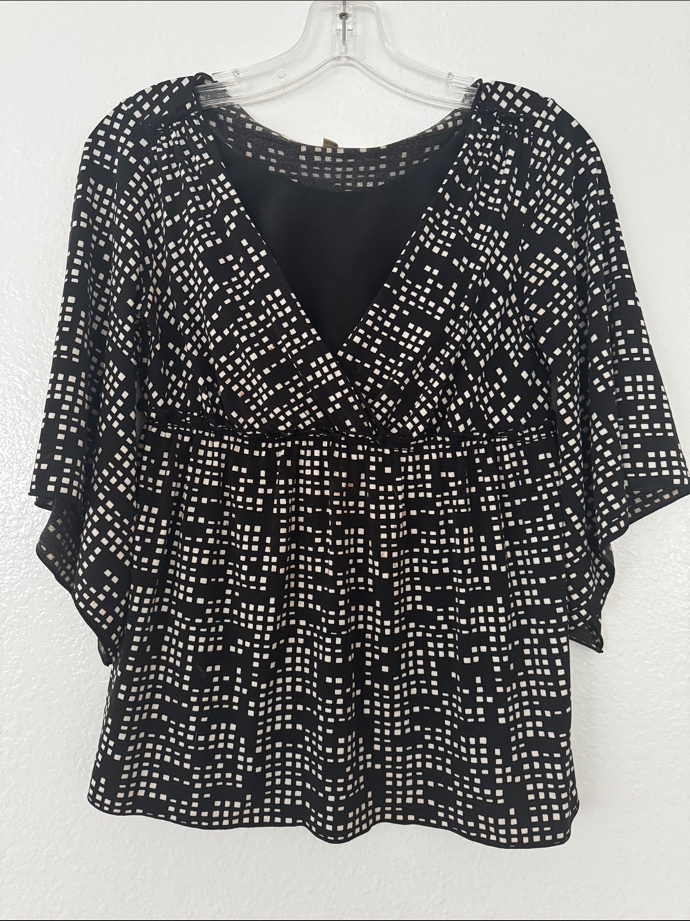Black and White Geo-Print V-Neck Blouse